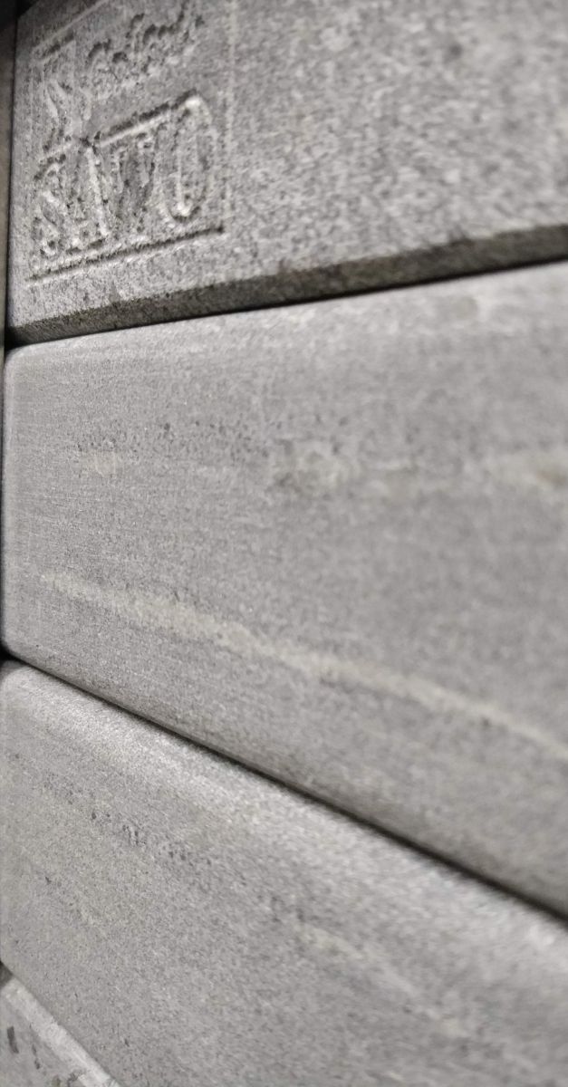 STONE SAWO SAUNA HEATER SOAPSTONE CLOSEUP 1200627 STONE SAWO SAUNA HEATER FINNISH SOAPSTONE CLOSEUP
