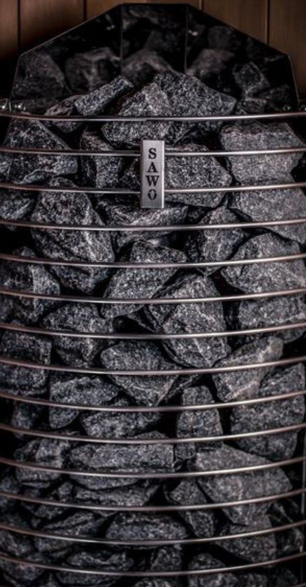 TOWERS SAWO SAUNA HEATER METAL DIABASE STONES CLOSEUP 1200627 TOWERS SAWO SAUNA HEATER METAL FINNISH OLIVINE DIABASE STONES CLOSEUP